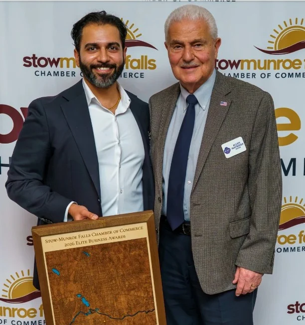 Dr. Maharshi Rajdev, MD accepts the 2026 Mayor's Award from Munroe Falls Mayor Allen Mavrides on behalf of Preferred Vascular Group's Akron Vascular Care team