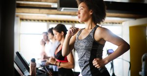 Group of healthy fit people cardio workout in gym; blog: 10 Aerobic Exercises for Vascular Health